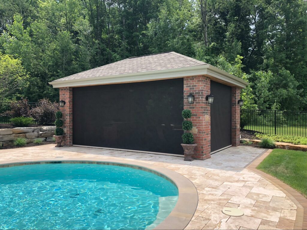 Poolside lanai with motorized retractable sun screen,Tampa, Florida retractable patio screen | Sun Protection