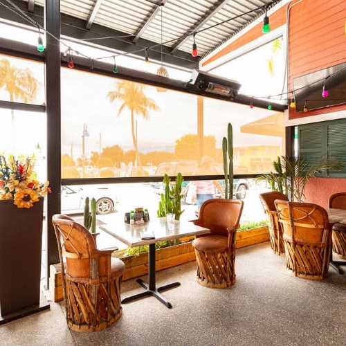 a business featuring commercial retractable sun screens from Sun Protection