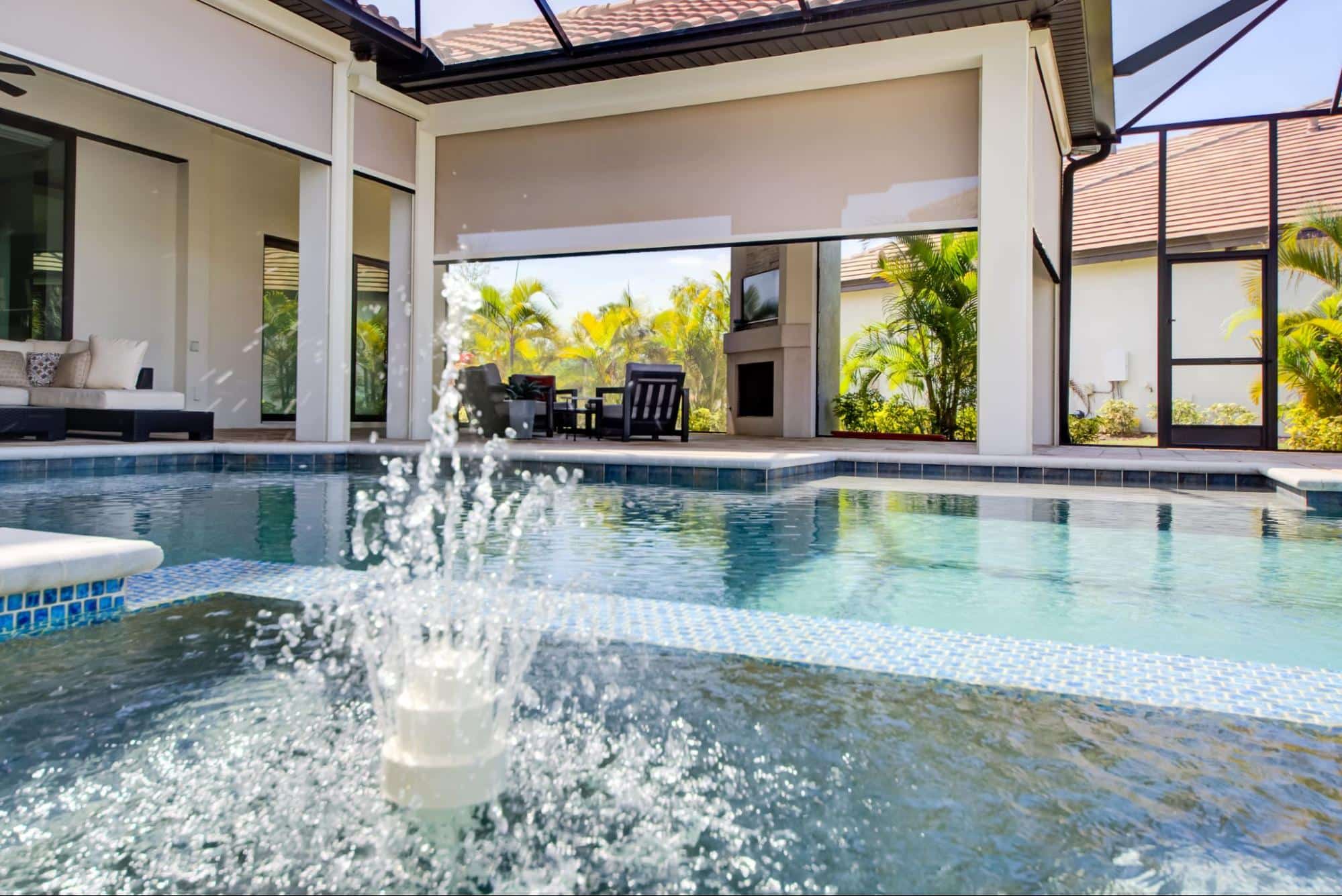 A gorgeous poolside lanai has upgraded the style and functionality of their home with retractable recessed patio screens. Contact us today to get your free customized quote.