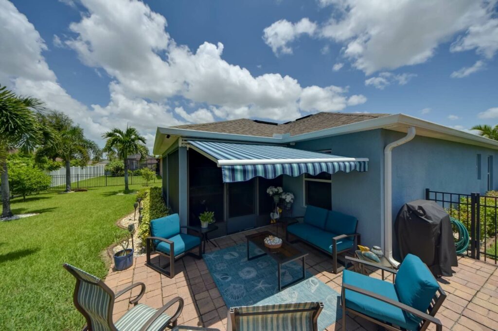 A retractable awning covers a patio.