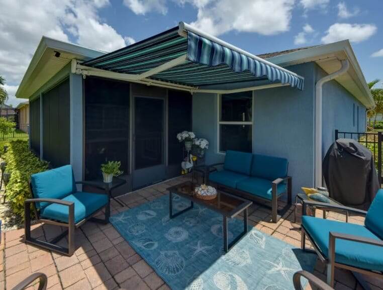 This home features a bright blue-striped awning to block out the hot South Florida sun. There are many styles and patterns available to instantly boost your home’s value.| Sun Protection