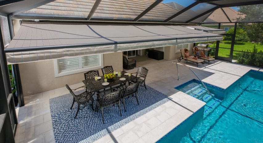 These Florida homeowners added a motorized retractable awning to their poolside patio to protect against the hot sun. This blog post discusses how to prepare for installation.