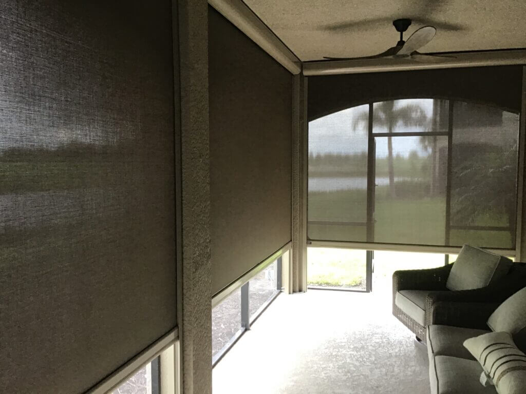 This Florida home features retractable motorized mosquito screens on its front porch. A remote control rolls the screens up and down with ease.| Sun Protection