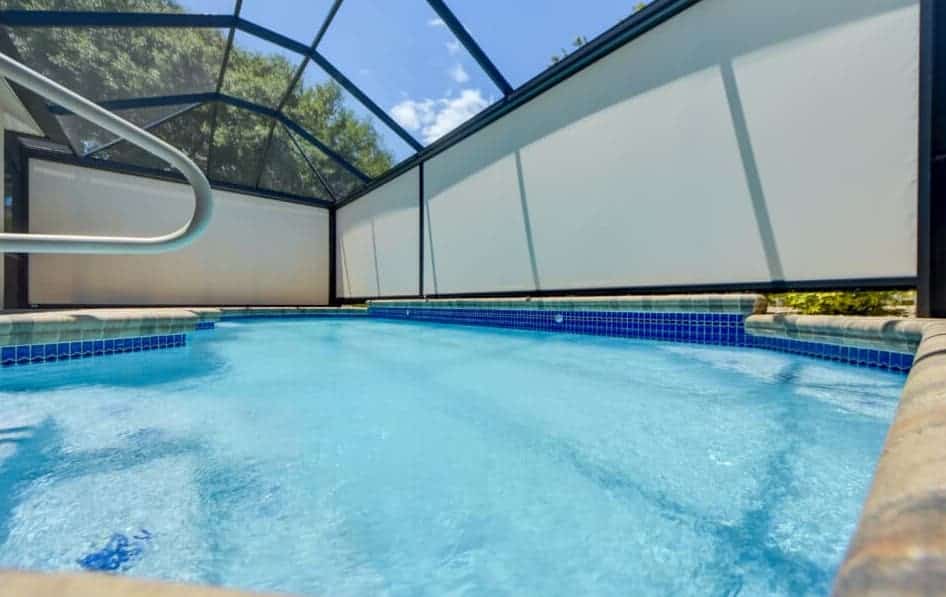 A home in Wesley Chapel, Florida opted to have multiple motorized privacy screens installed around their pool for seclusion and privacy at the press of a button.